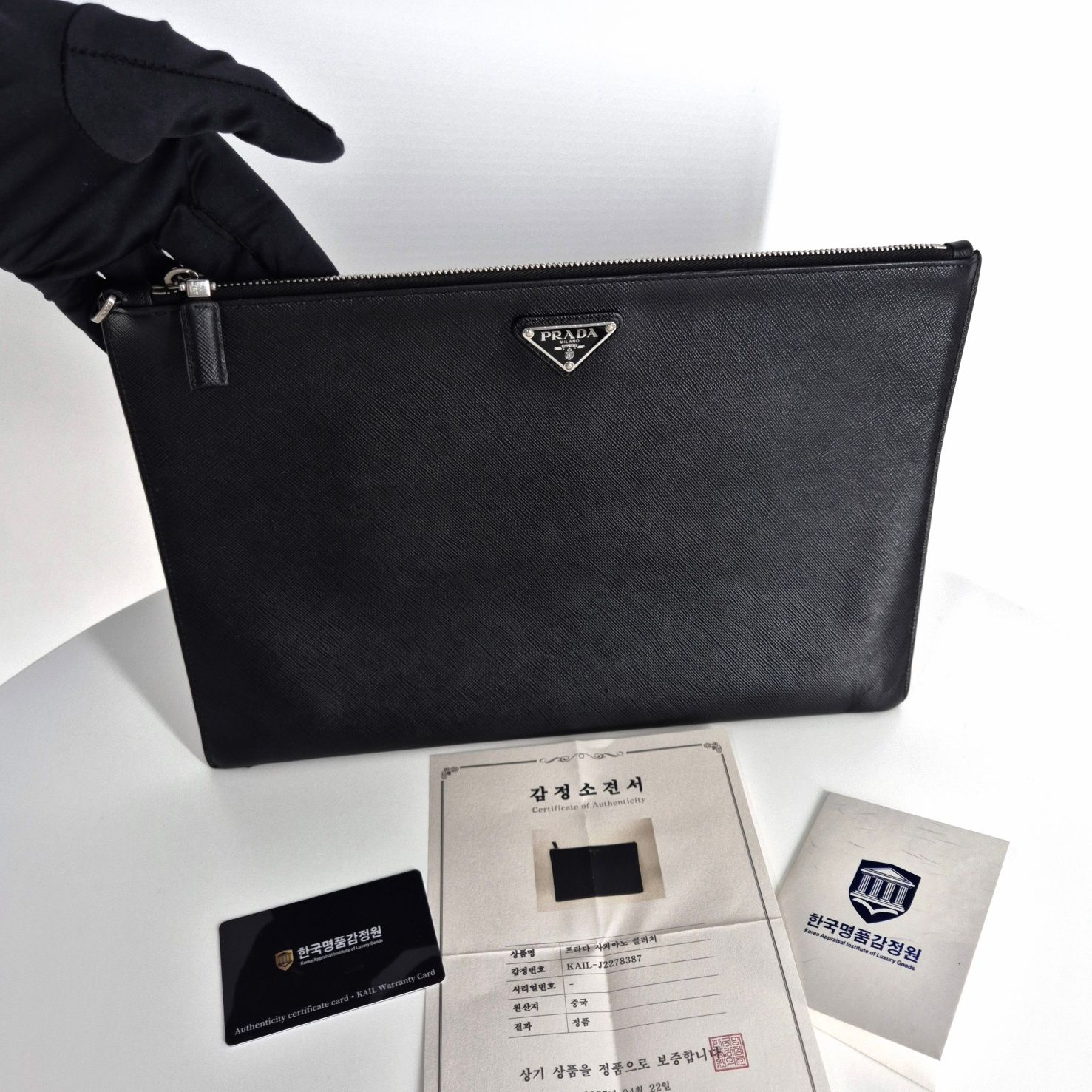 Prada Black Saffiano Triangle Logo Clutch Bag (2NH001)