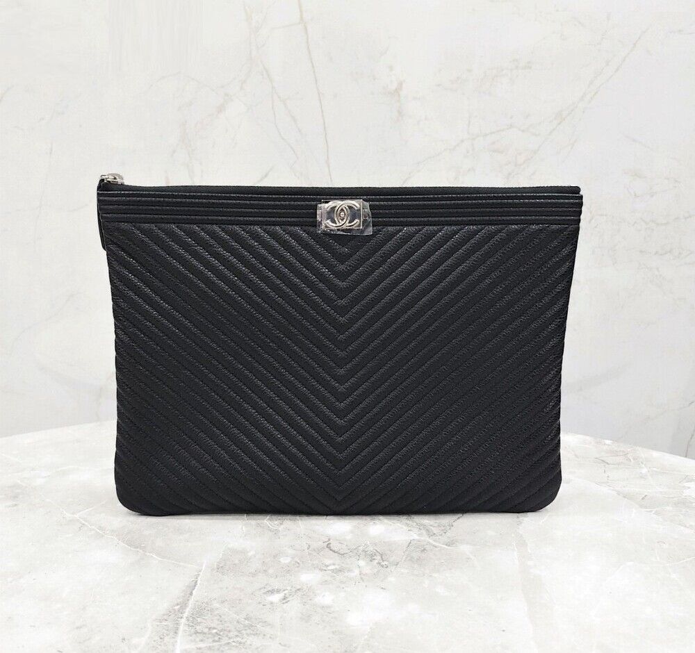 CHANEL Chevron Clutch Caviar Newmium A94406