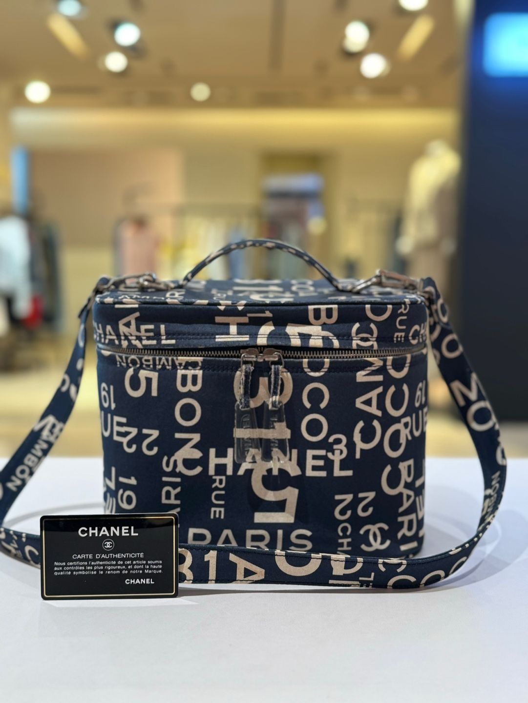 CHANEL Canvas Shoulder Bag with Top Handle 7th Edition SKU