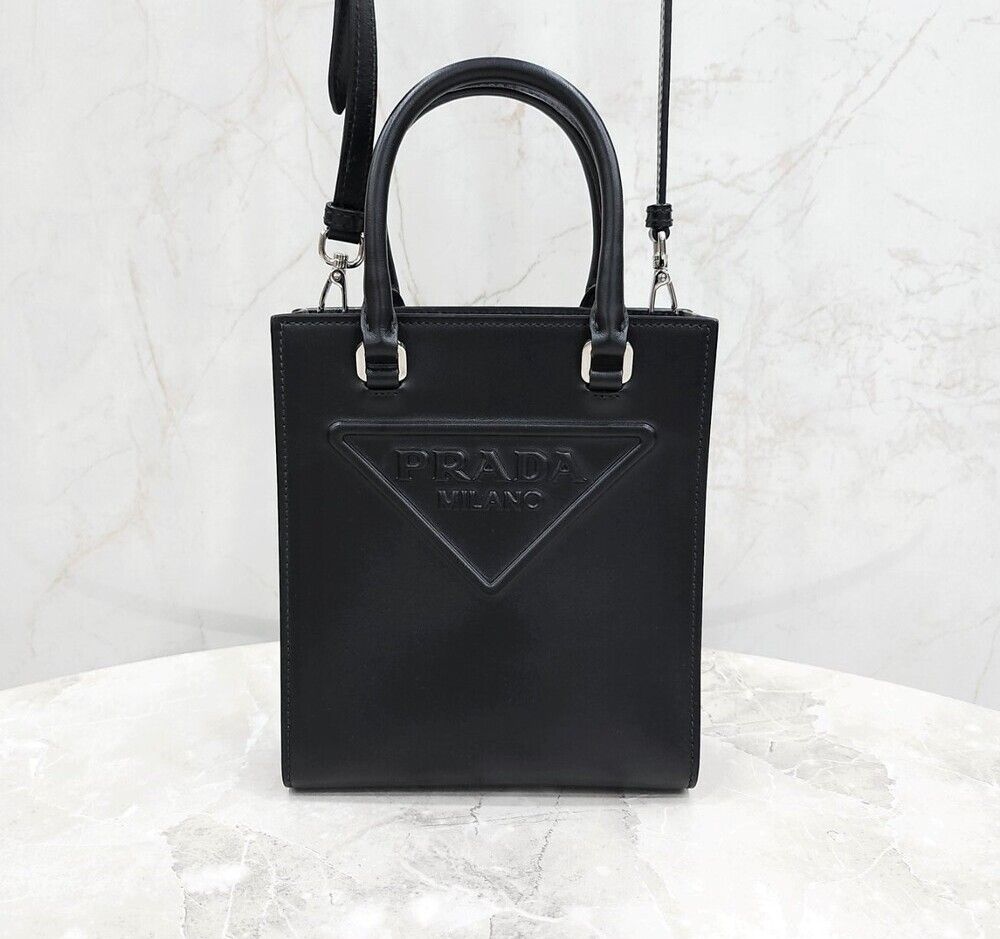 Prada Embossed Logo Triangle Mini Crossbody Bag SKU 123456