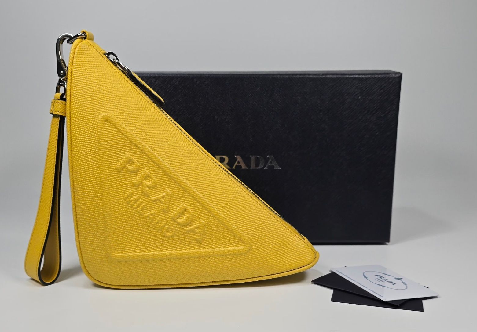 Prada Triangle Clutch Bag - SKU12345