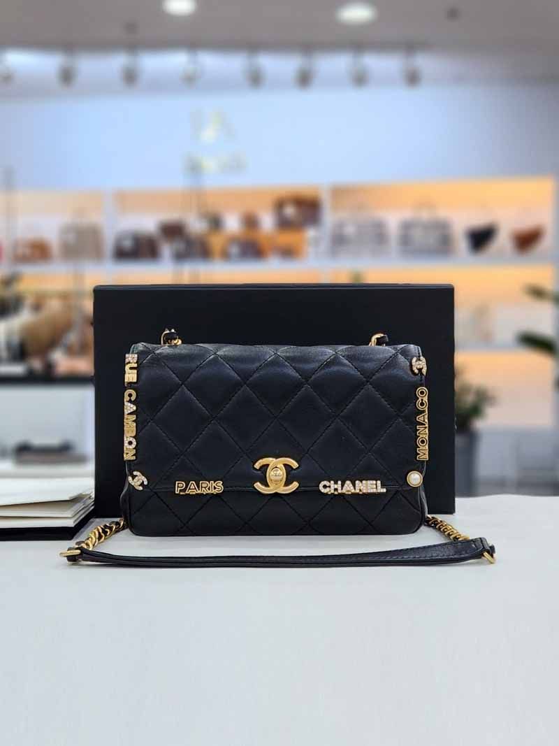 CHANEL Crystal Logo Gold-tone Mini Flap Crossbody Bag with Inlaid Chip 23