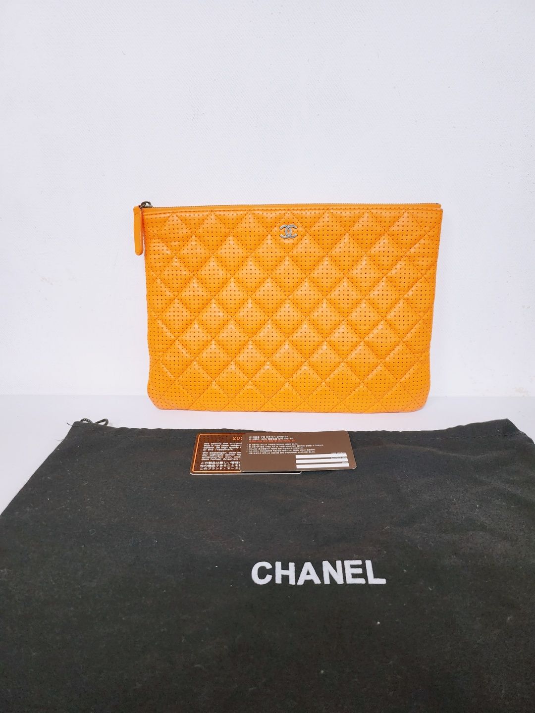 CHANEL Quilted Orange Clutch Bag Medium - CC Logo (SKU: CC0123)