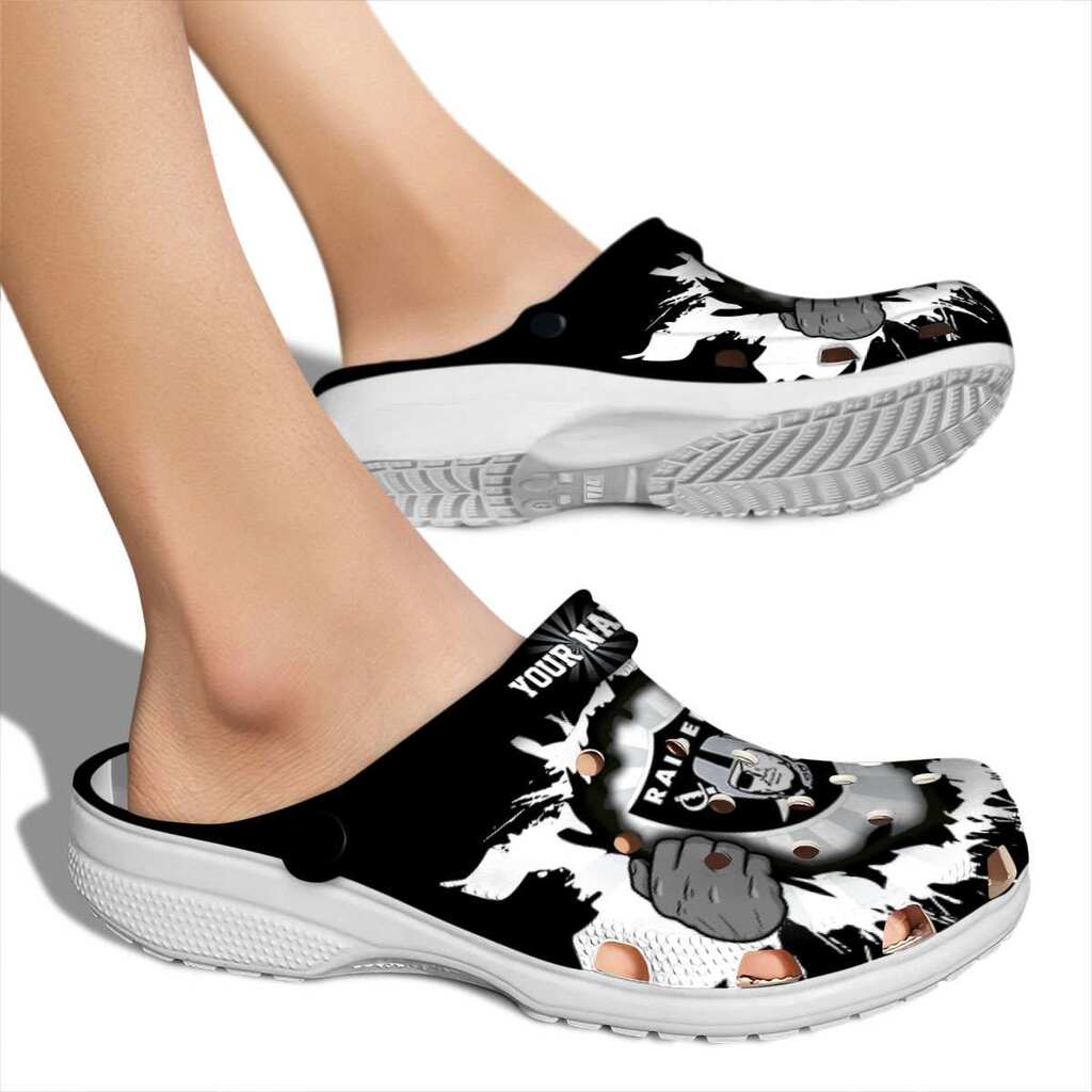Personalized Las Vegas Raiders Gripping Hand Crocs Shoes For Men And Women - Image 2