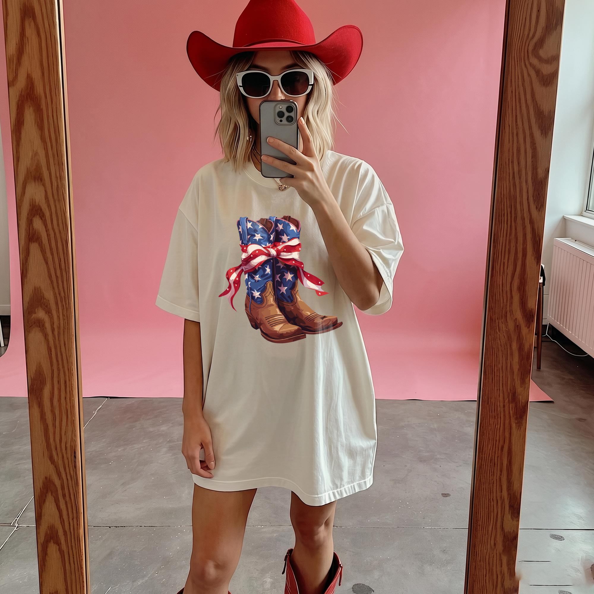 Vintage Cowboy Boot Bow Graphic T-Shirt Patriotic 4th of July Western Cowgirl Oversized Tee American Flag Star Ribbon Boots Graphic Shirt Cute Country Music Concert Top Women American Flag Patriotic Cowboy Boots Graphic Tee 4