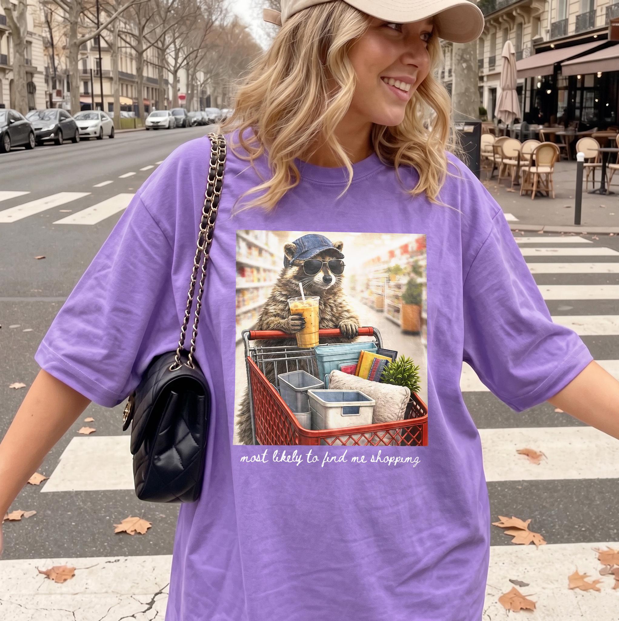 Women's Premium Cotton Graphic T-Shirt - Last Day of School Teacher Apparel, Raccoon Meme "Most Likely To Find Me Shopping" Print, Ribbed Breathable Fabric, Relaxed Fit Short Sleeve Wrap Top, End-of-Year Gift 2