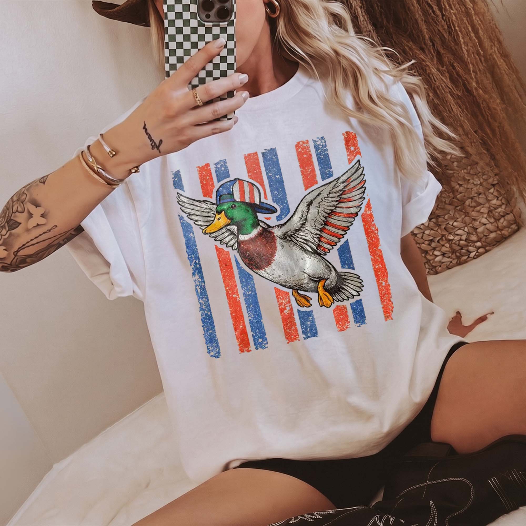 Flying Mallard Duck Patriotic 4th Of July Graphic T-Shirt Unisex Men Women Retro Southern Western Aesthetic Cream Cotton Summer Independence Day Waterfowl Hunting Tee Apparel Vintage USA American Flag Country Outdoors Casual Top 4