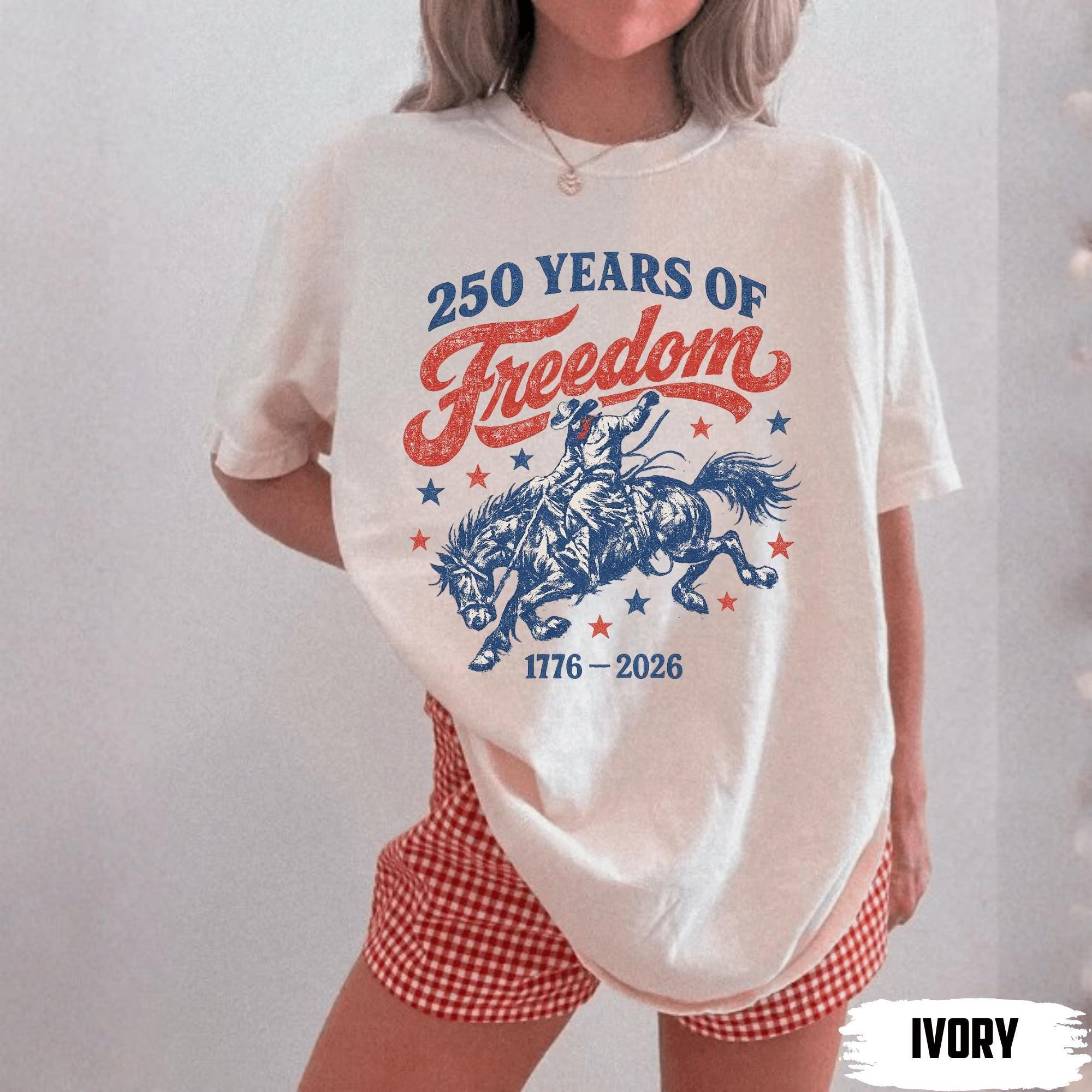 250 Years Of Freedom Cowboy Graphic Boxy Tee For Women Retro Western Cowgirl Aesthetic Ivory Cotton T-Shirt 1776-2026 4th Of July Patriotic Shirt Summer Festival Top Independence Day Country Music Gift 3