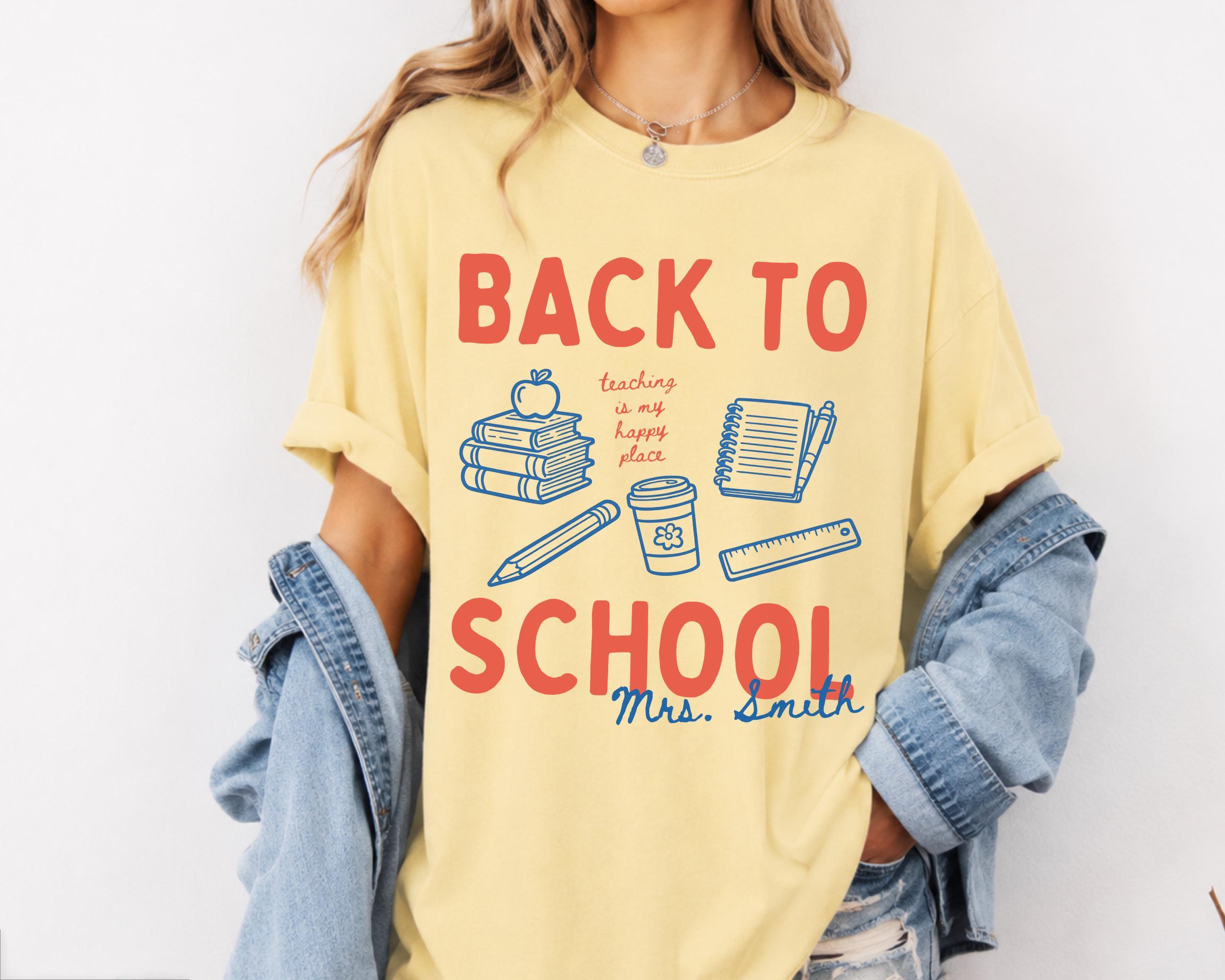 Custom Back To School Teaching Is My Happy Place Graphic T-Shirt For Teachers Retro Preppy Doodle Aesthetic Light Blue 100 Percent Cotton Comfort Colors Personalized Teacher Name Tee Elementary Educator Dream Team Squad Top 3