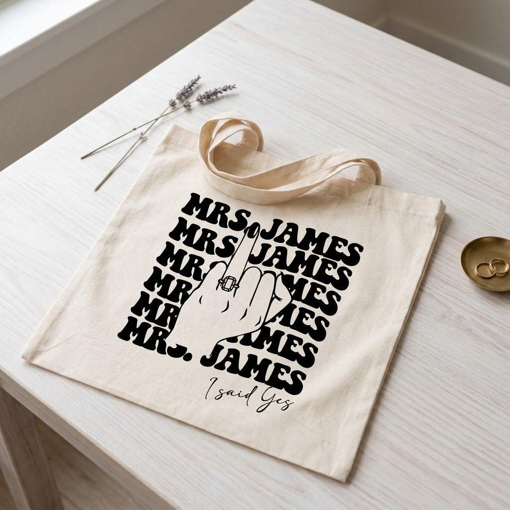 Custom Mrs Last Name Canvas Tote Bag for Alt Bride Edgy Retro Aesthetic Natural Cotton Bachelorette Party Gift Funny Engagement Ring Middle Finger Graphic Future Mrs Honeymoon Bridal Shower Survival Kit Accessory 2