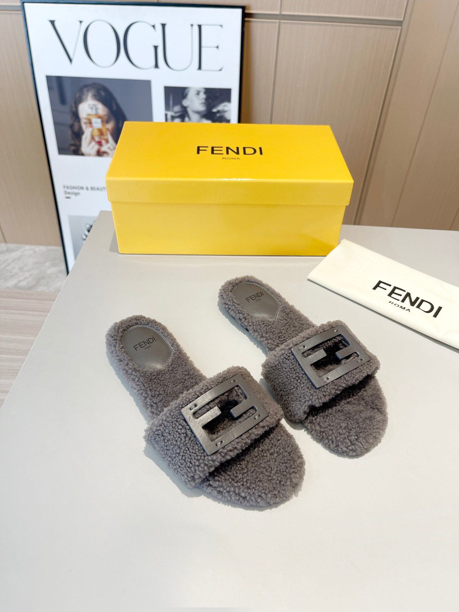 Fendi Baguette Shearling Slides In Gray