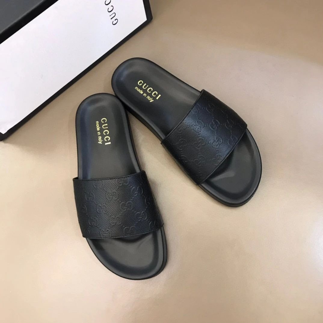 Gucci Gg Monogram Slide Sandals In Black