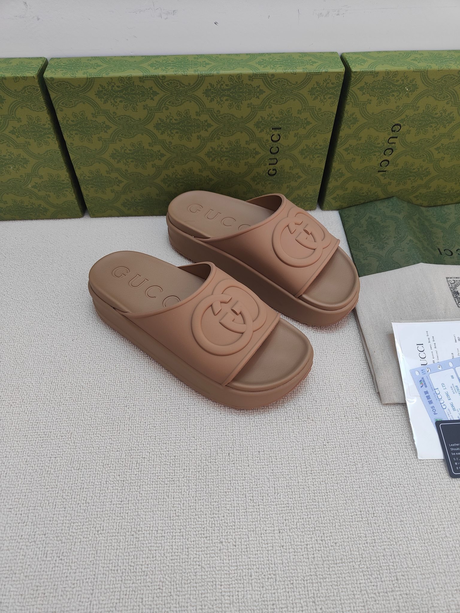 Gucci Interlocking G Slide Sandal In Brown Rubber