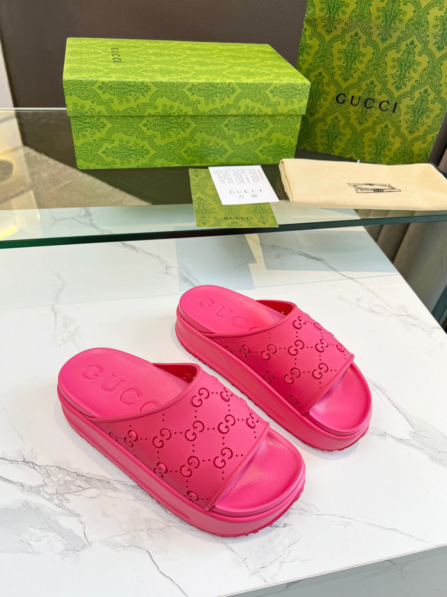 Gucci Perforated GG Slide Sandal In Pink Rubber