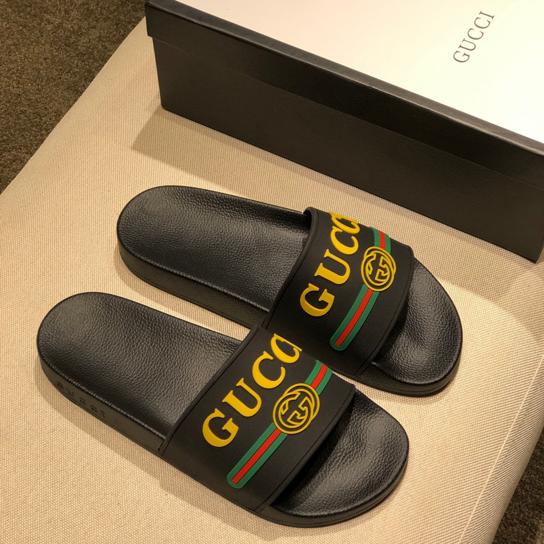 Gucci Yellow Logo Rubber Slide In Black