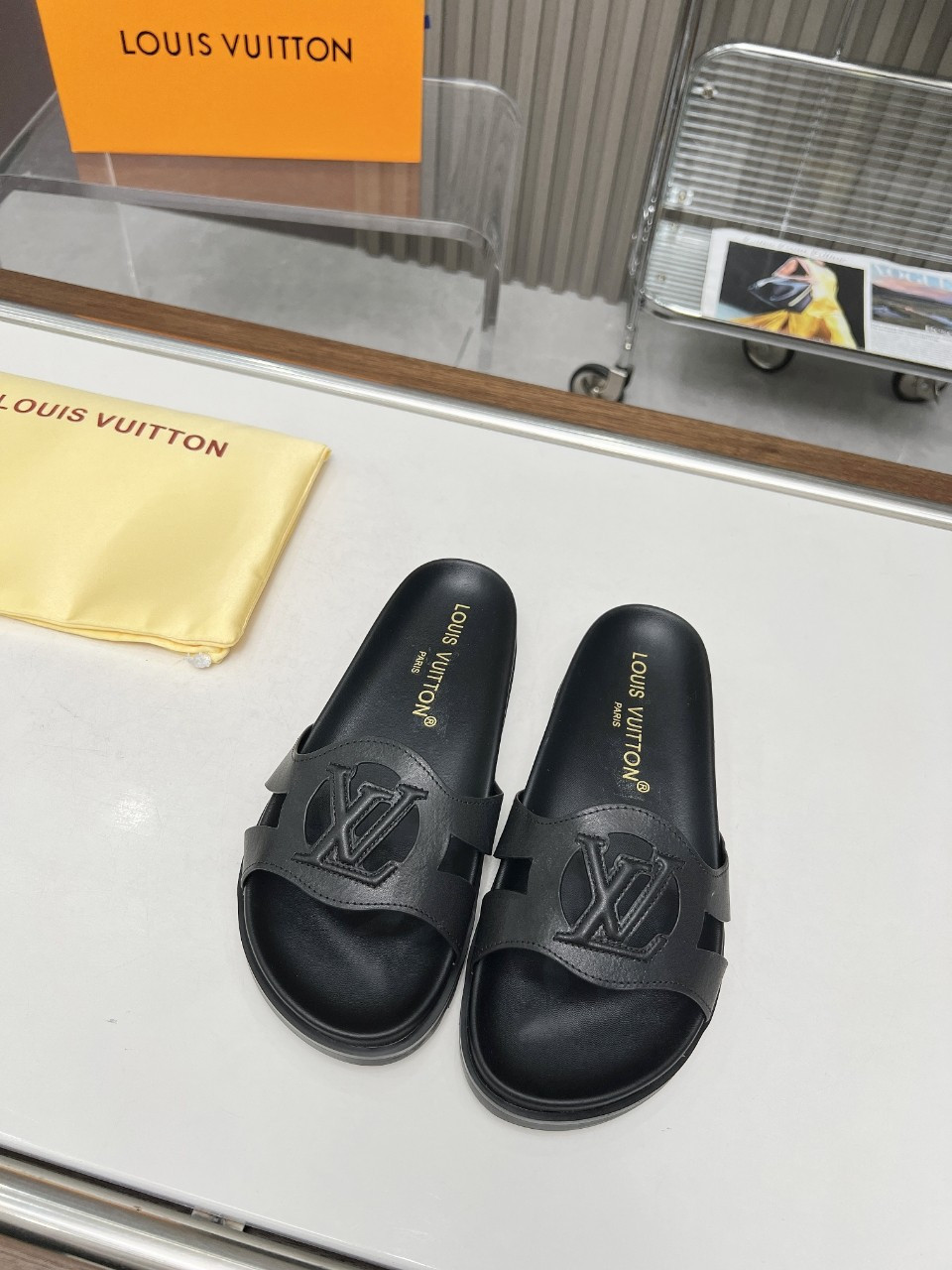 Louis Vuitton LV Isola Flat Comfort Mule In Black Cowhide