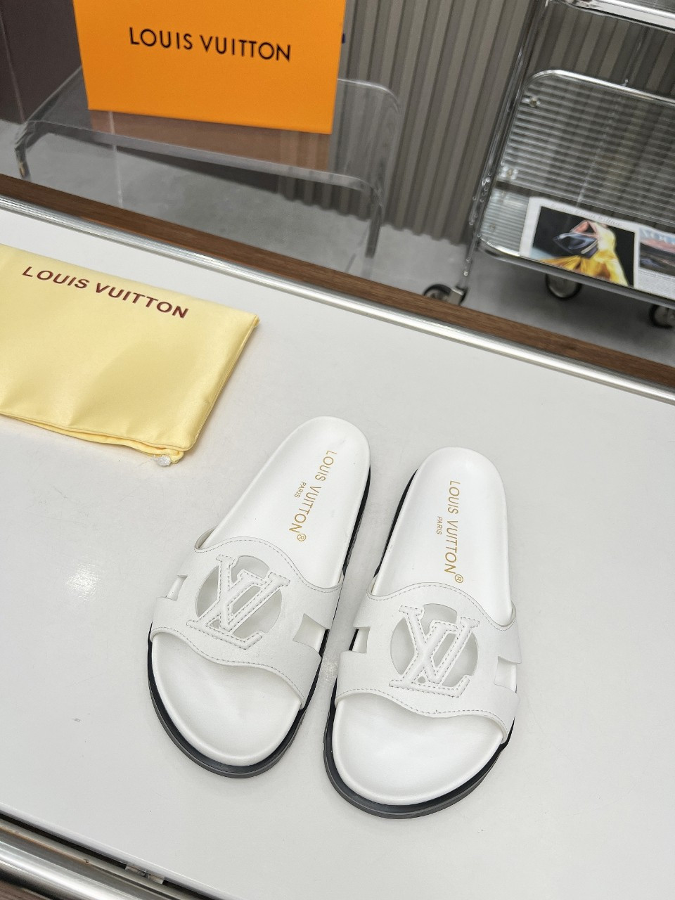 Louis Vuitton LV Isola Flat Comfort Mule In White Cowhide