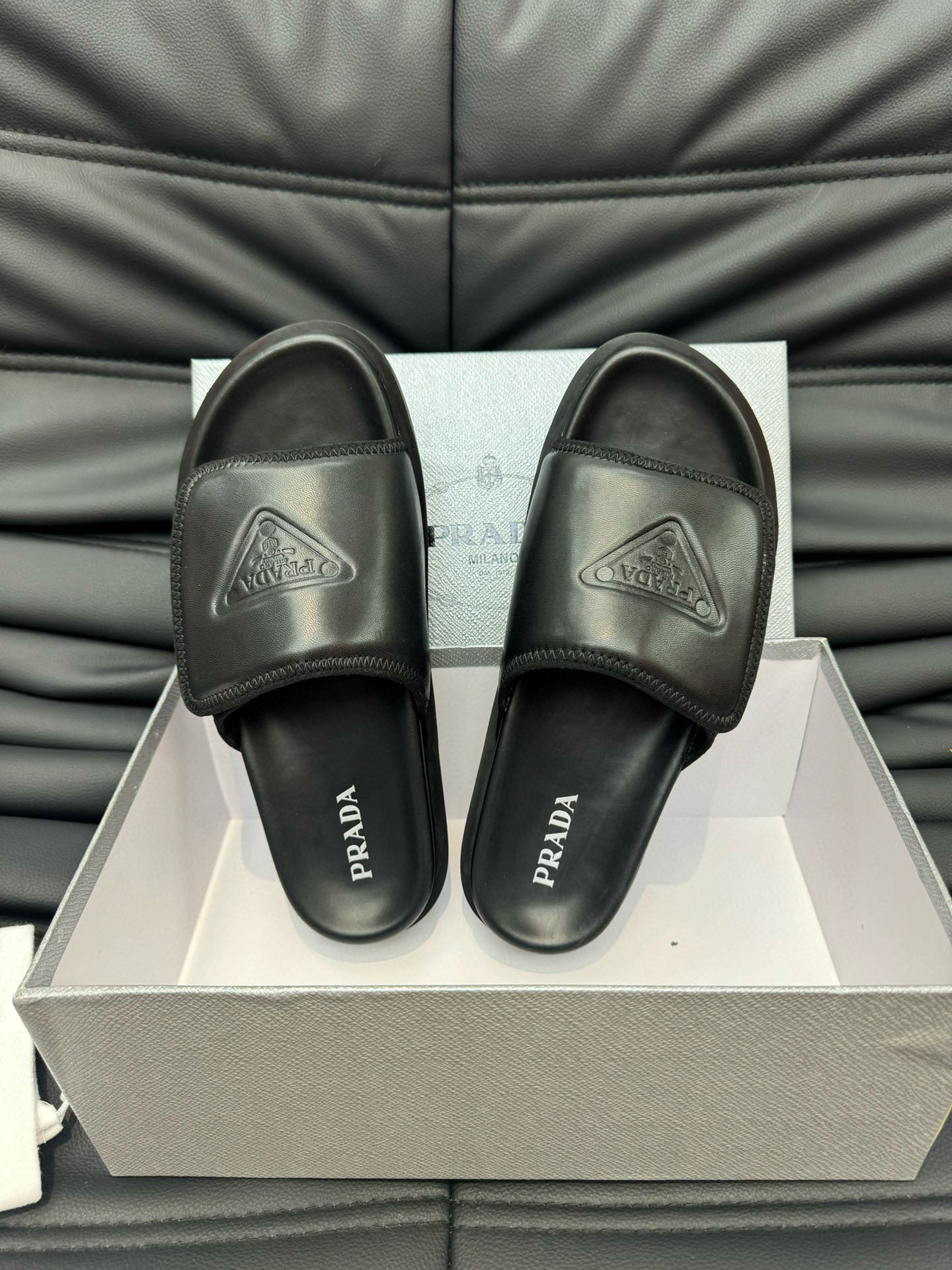 Prada Logo Soft Padded Nappa Leather Slides In Black