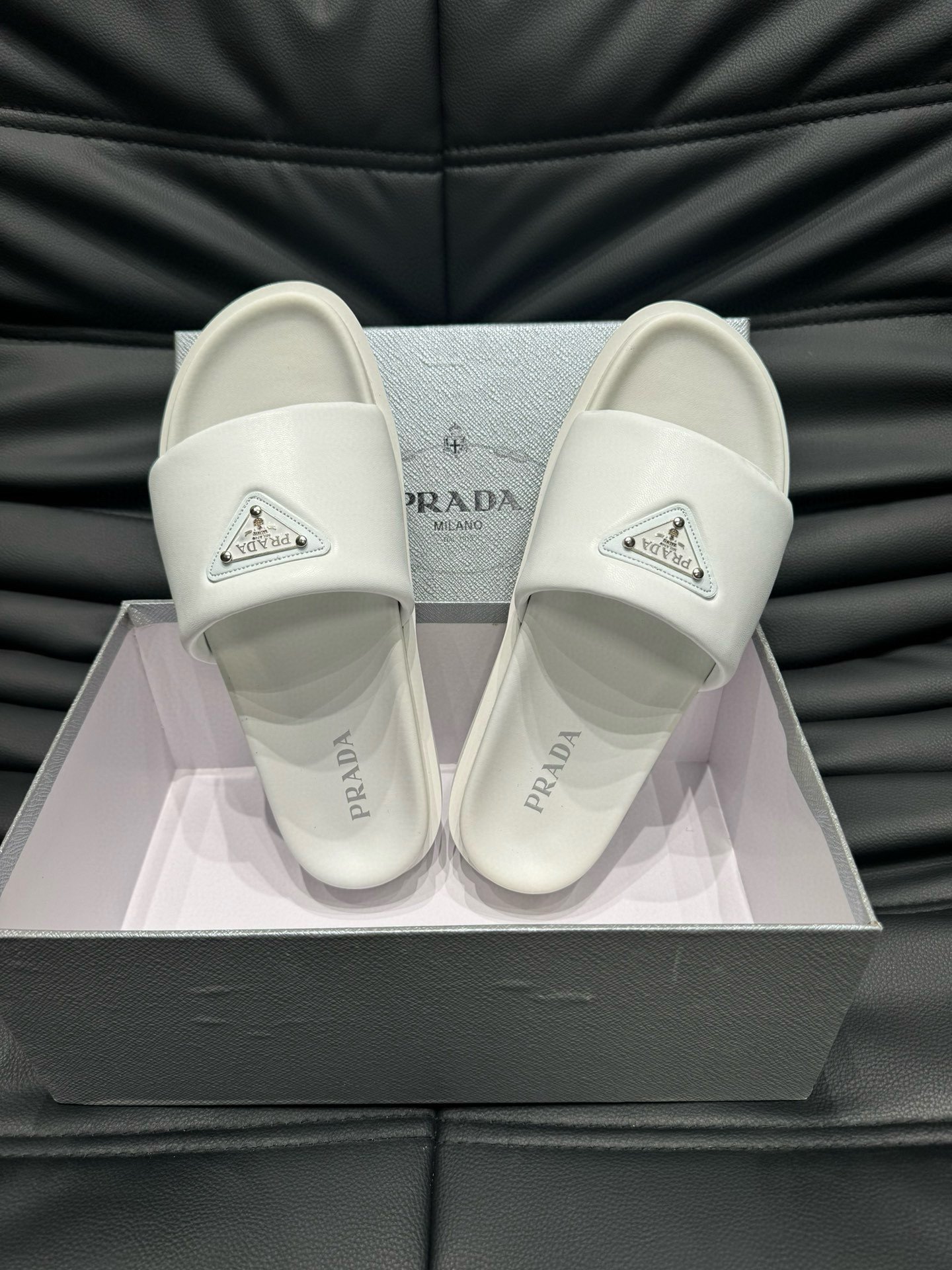 Prada Padded Nappa Leather Slides In White
